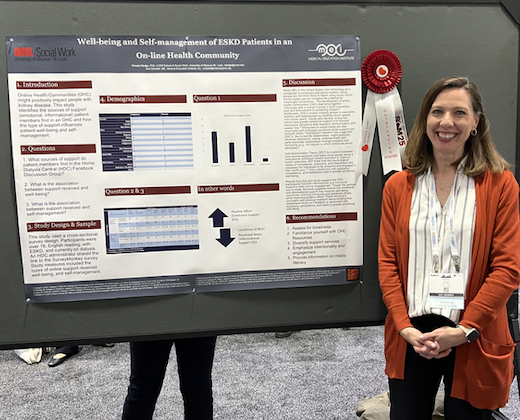 Renata Sledge, PhD standing next to her poster.